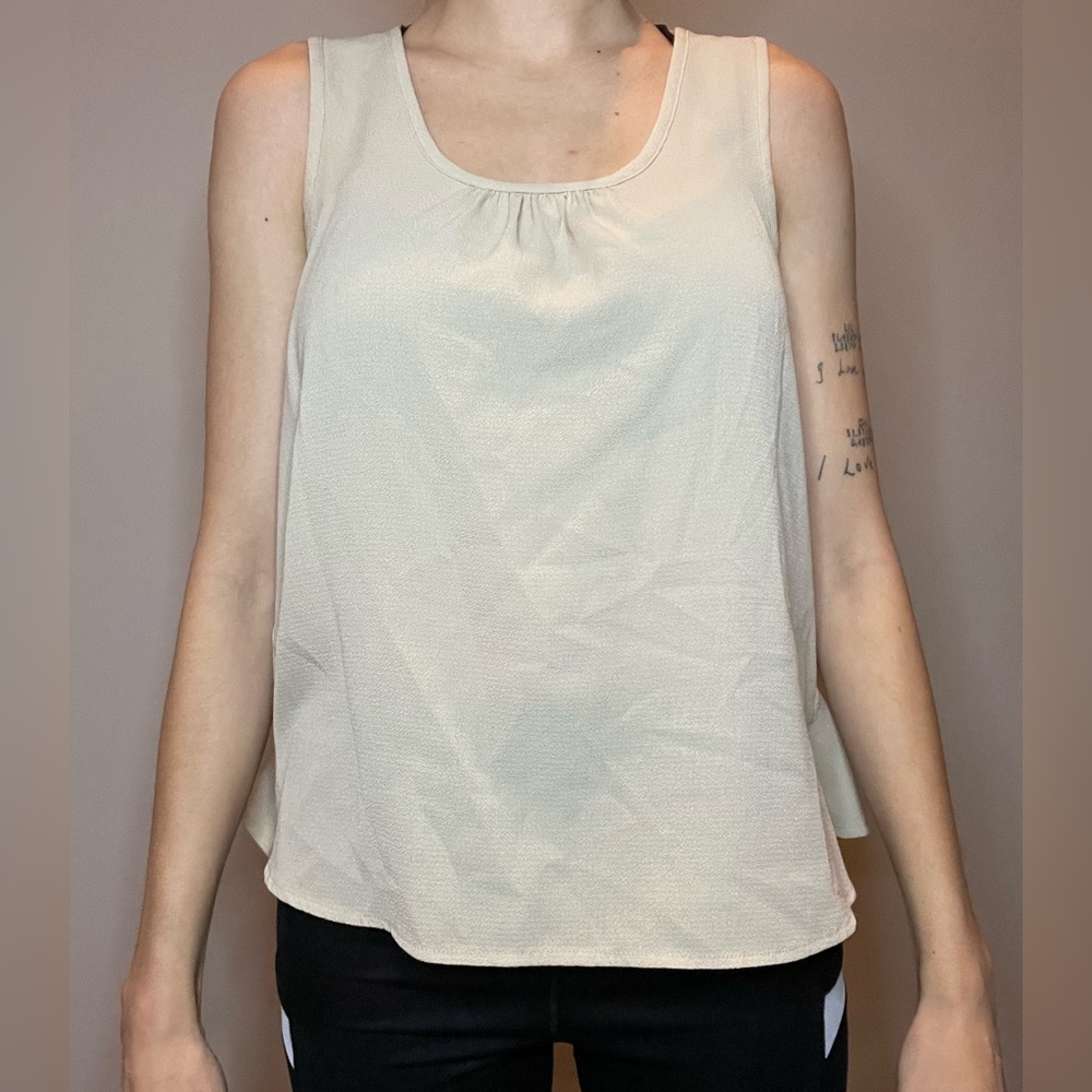 Beige tank top with lace backing. Size S